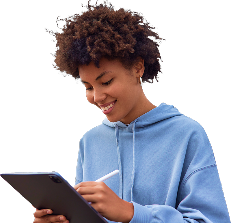 a girl writing on her ipad